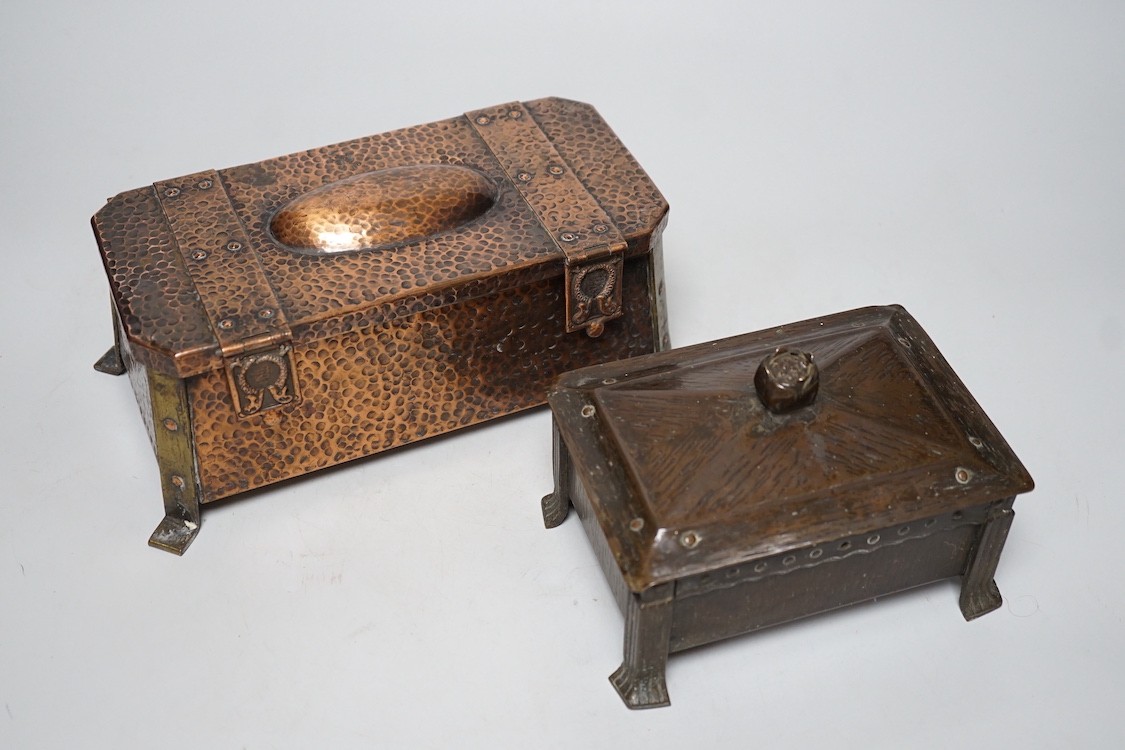 An Arts & Crafts hammered copper and brass mounted casket 23cms wide x 9cms high, together with a smaller similar casket